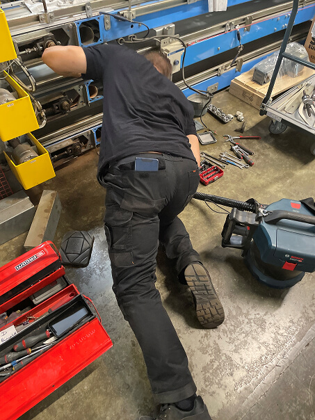 Entretien et maintenance de convoyeurs Maintenance préventive d'un convoyeur industriel